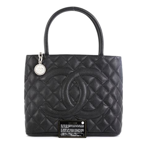 chanel medallion tote quilted caviar.